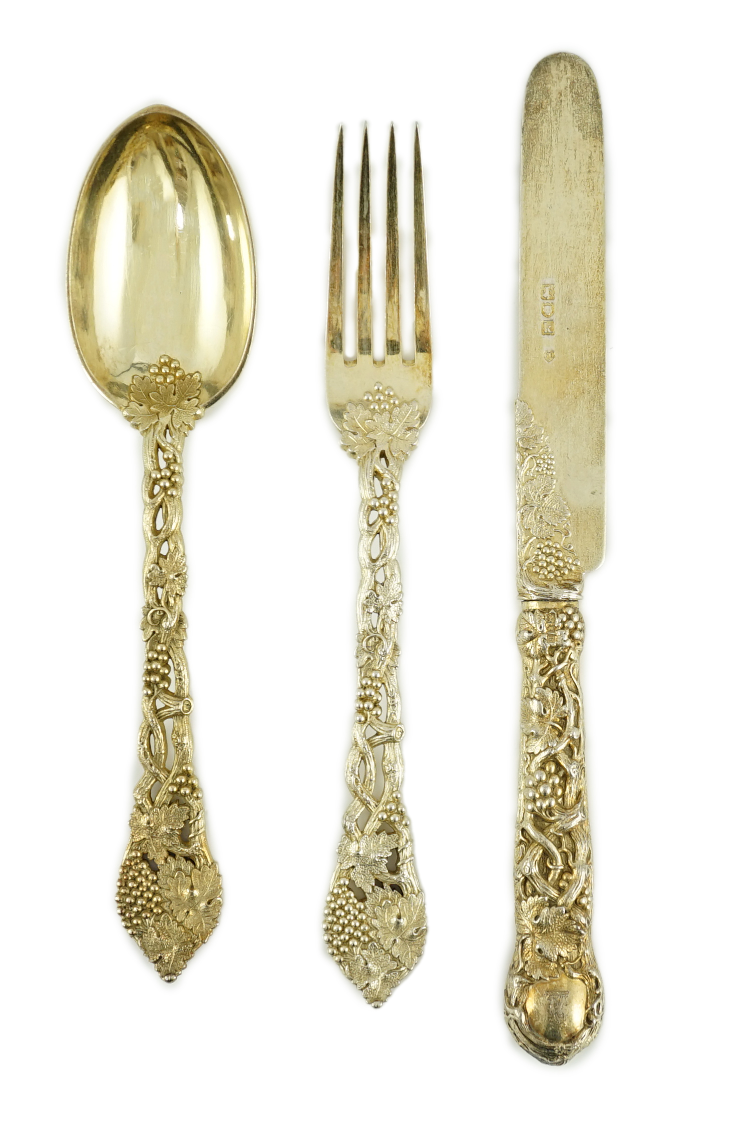 A Victorian and later matched silver gilt part canteen of dessert cutlery by Francis Higgins II & III